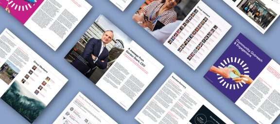 Collection of printed materials on community outreach, featuring photos, group member profiles, executive message, and various informational pages.
