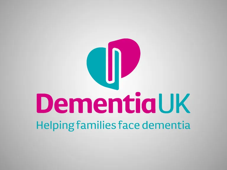 Dementia UK logo featuring a heart-shaped icon with a stylised 'D' inside, with the text "Dementia UK" and the tagline "Helping families face dementia."