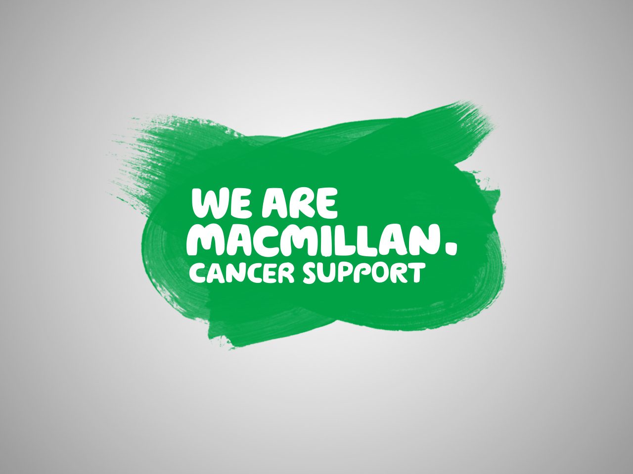 Green brushstroke with white text saying "We are Macmillan. Cancer support" on a grey background.