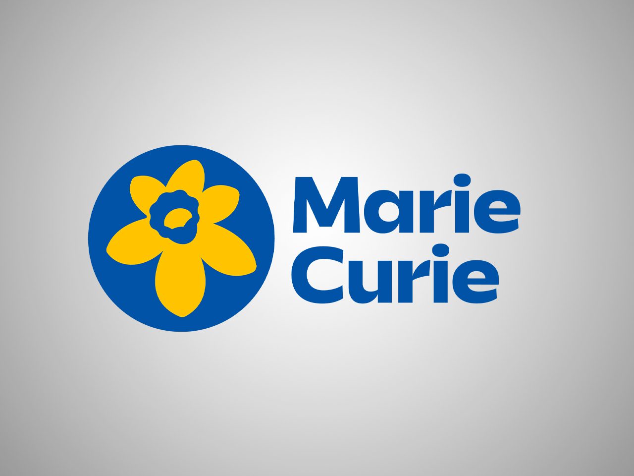 A logo with a blue circle containing a yellow flower and the text "Marie Curie" in bold blue font on a light grey background.