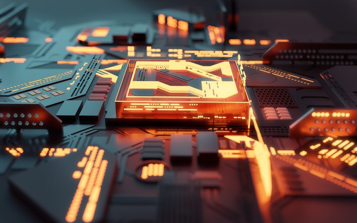 Close-up of a futuristic circuit board with glowing orange and yellow elements, featuring a central illuminated rectangular component.