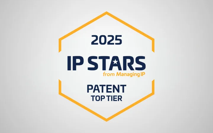 Hexagon badge with "2025 IP STARS from ManagingIP," "Patent Top Tier" text inside, on a light gray background.