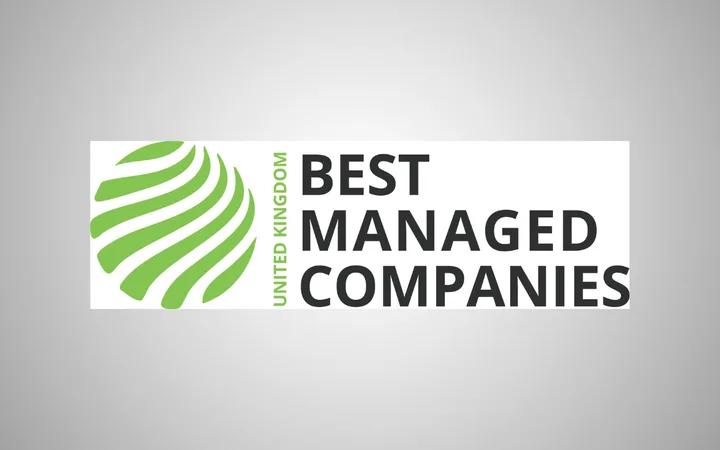Green and black logo featuring a stylised globe on the left and the text "UNITED KINGDOM BEST MANAGED COMPANIES" on the right, against a grey background.