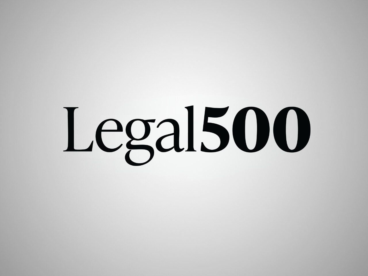 Legal500 logo with black serif text reading "Legal500" on a pale grey gradient background.