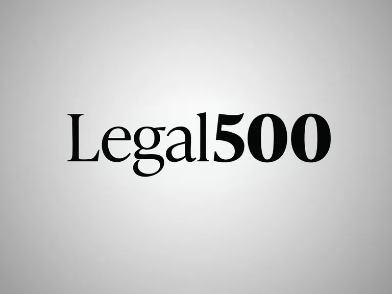 Legal500 logo with black serif text reading "Legal500" on a pale grey gradient background.
