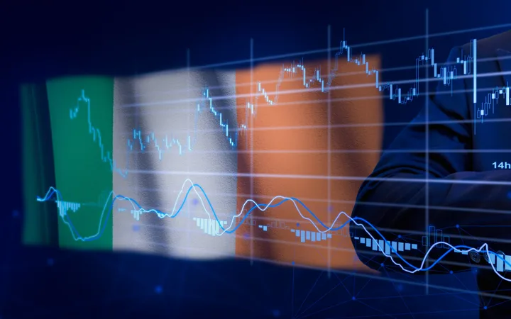 Businessman in a suit interacts with a digital trading interface featuring stock charts, buy and sell options, and financial icons.