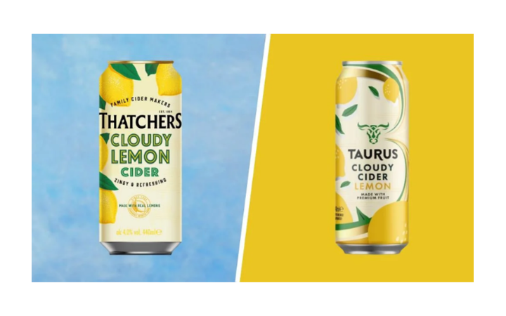 Two cans of cloudy lemon cider, one from Thatchers on a blue background and one from Taurus on a yellow background, positioned side by side.