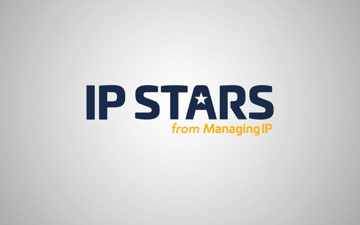 "IP STARS logo with a star inside the letter A, accompanied by the tagline 'from Managing IP' in orange, set against a light grey background."