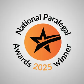 Orange circular badge featuring a black star with a swoosh, surrounded by curved text reading 'National Paral... Awards 2025 winner' on a light grey background.
