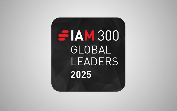 Black and red logo with "IAM 300 GLOBAL LEADERS 2025" on a dark geometric background, centred on a light grey gradient background.