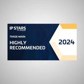 A certificate with a navy blue and cream hexagonal design, indicating the trade mark "Highly Recommended" by IP Stars for 2024.