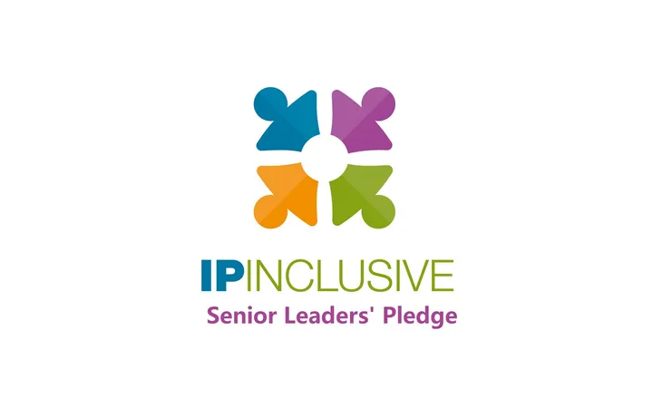 A multicoloured logo with four abstract human figures forming a circle, accompanied by the text "IP INCLUSIVE Senior Leaders' Pledge" in blue, green, and purple.