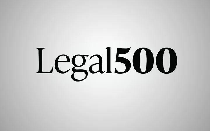 Logo-style image showing the word Legal500 in black serif font on a light grey gradient background.