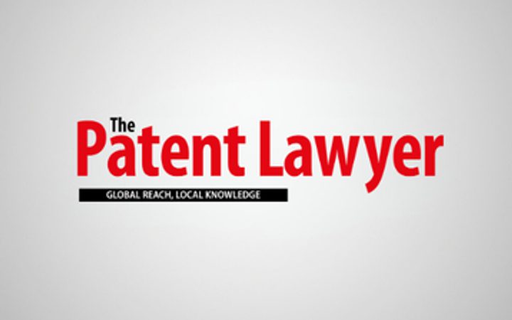"The Patent Lawyer" logo with bold red text and a black underline, set against a light grey background, emphasizing legal expertise and professionalism.