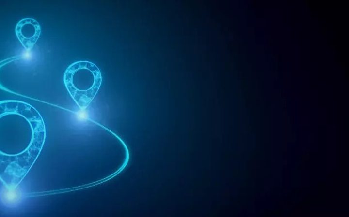Four glowing map location markers connected by a curved line, set against a dark blue background symbolising navigation or tracking.