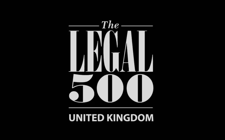 The logo for the Legal 500 UK features bold grey text on a black background, with "The" above and "United Kingdom" below the larger name.